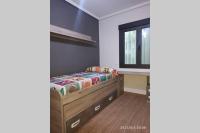 Postel nebo postele na pokoji v ubytování Apartamento reformado 1º