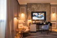 Savhotel Aemilia Bolognaにあるテレビまたはエンターテインメントセンター