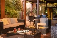 Savhotel Aemilia Bolognaにあるシーティングエリア