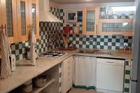A kitchen or kitchenette at Prestigioso terratetto a 100 mt dal mare