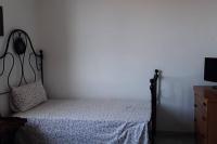 A bed or beds in a room at Prestigioso terratetto a 100 mt dal mare