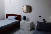 A bed or beds in a room at Prestigioso terratetto a 100 mt dal mare