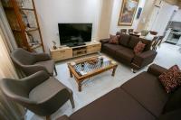 TV a/nebo společenská místnost v ubytování Moza House