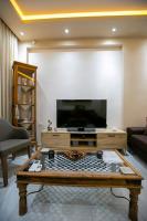 TV a/nebo společenská místnost v ubytování Moza House