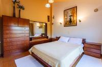 Posteľ alebo postele v izbe v ubytovaní Beachfront luxury villa-Private pool,Garden Heaven