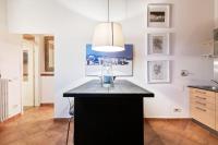 A kitchen or kitchenette at Palazzo Pitti & Boboli Comfortable Apartment
