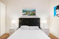 A bed or beds in a room at Palazzo Pitti & Boboli Comfortable Apartment