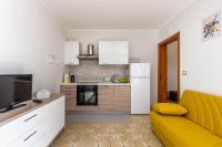 A kitchen or kitchenette at House&Villas - Mare Blu