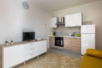 A kitchen or kitchenette at House&Villas - Mare Blu