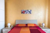 A bed or beds in a room at House&Villas - Mare Blu