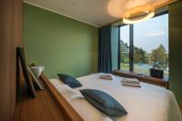 A bed or beds in a room at Villaverde Hotel Spa&Golf Udine