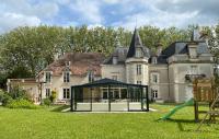 a large house with a playground in front of it at Château l&#39;Hubertière, classé du tourisme 4 étoiles in Bouresse