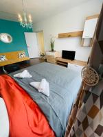 A bed or beds in a room at La casa de Mary