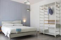 A bed or beds in a room at ReGenzio