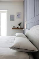 A bed or beds in a room at ReGenzio