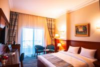 Postel nebo postele na pokoji v ubytování Lamar Azur Hotel