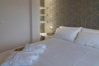 Posteľ alebo postele v izbe v ubytovaní Garden Fisterra - Jacuzzi, Jardín Privado y Vista Mar
