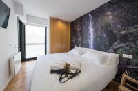 Posteľ alebo postele v izbe v ubytovaní Garden Fisterra - Jacuzzi, Jardín Privado y Vista Mar