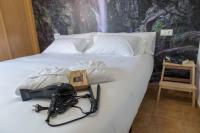 Posteľ alebo postele v izbe v ubytovaní Garden Fisterra - Jacuzzi, Jardín Privado y Vista Mar