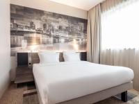 Novotel Duesseldorf Airportにあるベッド