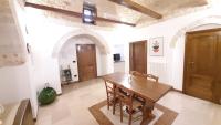 A television and/or entertainment centre at Capodigallo Holiday Trullo Monte Santo