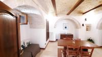 A seating area at Capodigallo Holiday Trullo Monte Santo