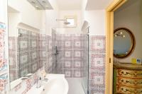 a bathroom with a sink and a shower at Casa Teresa in Positano
