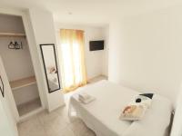 Postel nebo postele na pokoji v ubytování Salitre Rooms