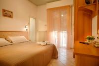 Posteľ alebo postele v izbe v ubytovaní Hotel Verdemare