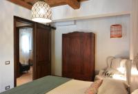 Łóżko lub łóżka w pokoju w obiekcie Agriturismo Podere Il Sorbo