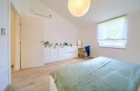 Postel nebo postele na pokoji v ubytování Apartments Aster