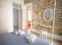 A bed or beds in a room at Anastasia Traditional House