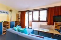 Televízia a/alebo spoločenská miestnosť v ubytovaní Family-Appartements