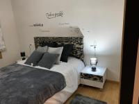 A bed or beds in a room at A&M Burela Costa
