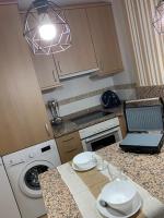 A kitchen or kitchenette at A&M Burela Costa