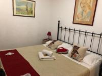 Postel nebo postele na pokoji v ubytování B&B Antonella