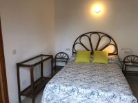 Łóżko lub łóżka w pokoju w obiekcie Casa Mar con patio en playa de Son Serra de Marina