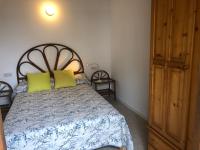 Łóżko lub łóżka w pokoju w obiekcie Casa Mar con patio en playa de Son Serra de Marina