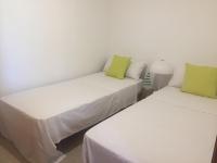 Łóżko lub łóżka w pokoju w obiekcie Casa Mar con patio en playa de Son Serra de Marina