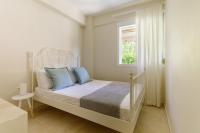 Posteľ alebo postele v izbe v ubytovaní Siviri Forest View Apartment
