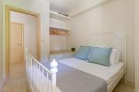 Posteľ alebo postele v izbe v ubytovaní Siviri Forest View Apartment