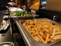 a tray of french fries on a buffet at Talmud Hotel Taichung in Taichung