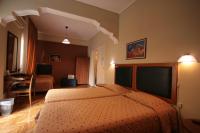 Posteľ alebo postele v izbe v ubytovaní Adams Hotel