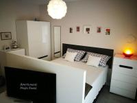 Posteľ alebo postele v izbe v ubytovaní Apartament Magia Rewal