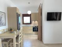 Televízia a/alebo spoločenská miestnosť v ubytovaní Blue Coast - Seaside Apartment