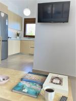 Kuchyňa alebo kuchynka v ubytovaní Blue Coast - Seaside Apartment