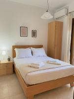 Posteľ alebo postele v izbe v ubytovaní Blue Coast - Seaside Apartment
