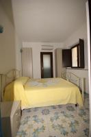 Posteľ alebo postele v izbe v ubytovaní Hotel La Marina