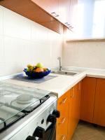 Kuchyň nebo kuchyňský kout v ubytování Apartment Barolinke