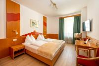 Postel nebo postele na pokoji v ubytování Der Thaller - Wirtshaus - Restaurant - Hotel